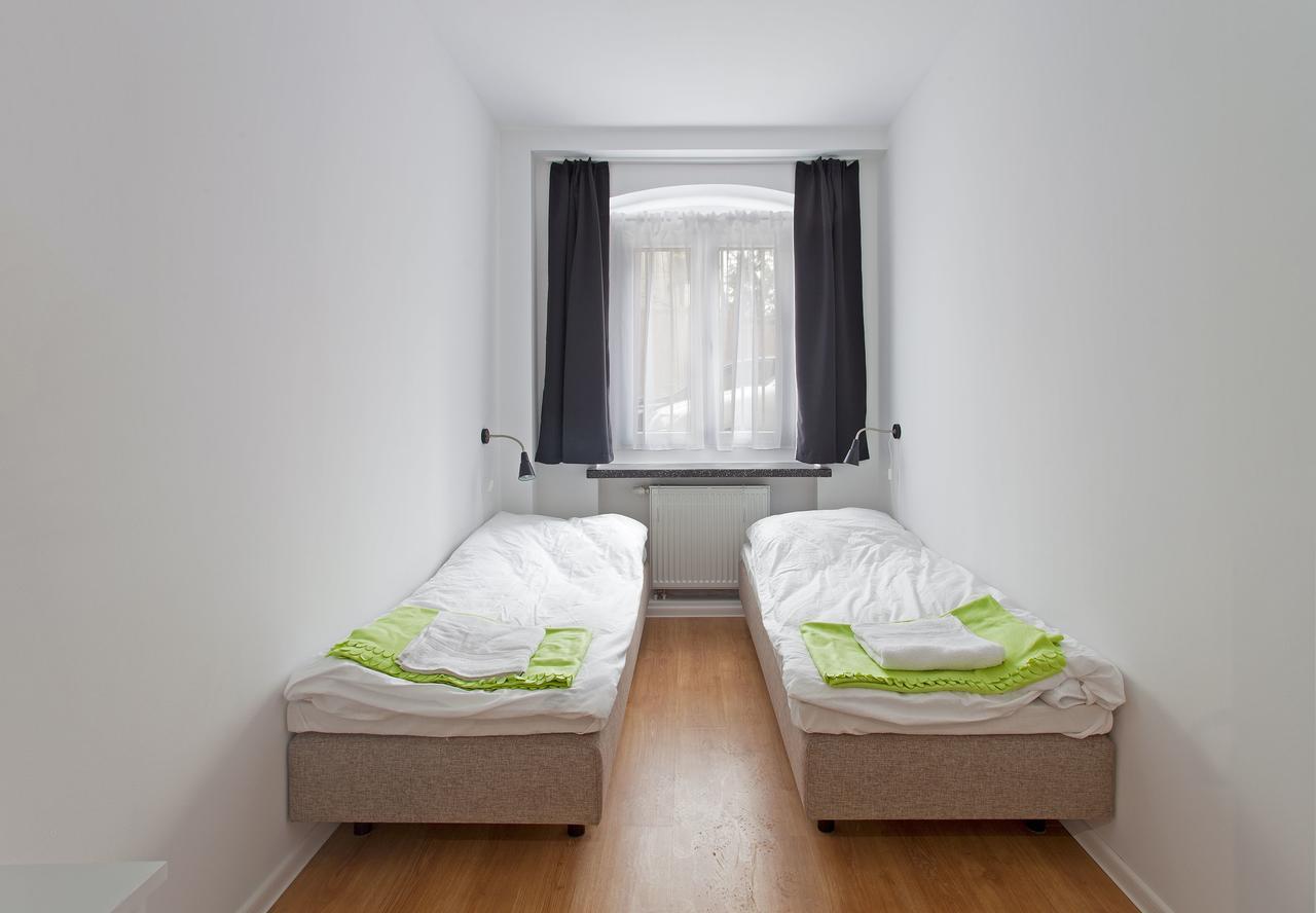 פוזנן Opera Hostel חדר תמונה
